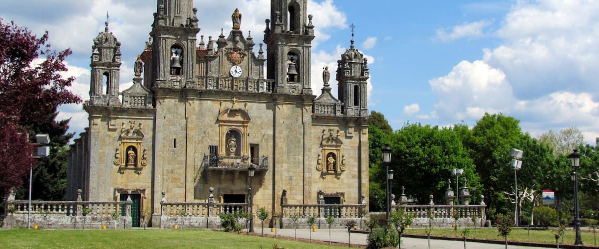 A historic cathedral with intricate architecture and a clock tower.