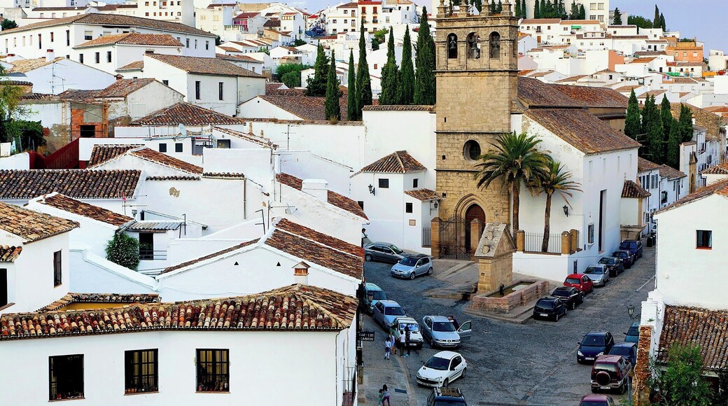 A view of Ronda's old Moorish quarter. In the center of the photo is the 16th-century church of our Father Jesus. In front of the church you'll find a triangular pediment called the Fuente de los Ocho Caños - or Eight Spouts Fountain. In the 1700s this was the commercial center of the city, and this large public fountain was built to serve the community.