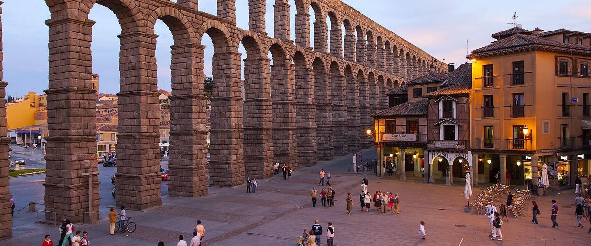 Join the locals during the evening paseo (nightly walk) near the city's iconic 2000-year-old Roman aqueduct. The main action happens at Plaza Azoguejo, which the aqueduct crosses on it's way to the Alcázar. The aqueduct was built to provide the Roman military base here with a steady supply of water from the Fría River, some 9 miles away. It was so well engineered that it continued to supply water until the late 19th century.