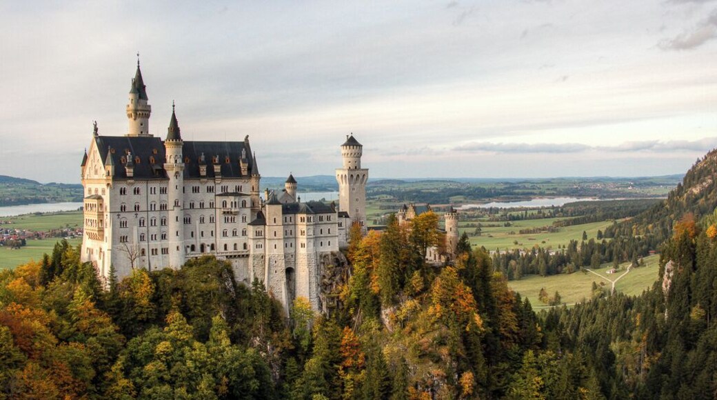 Neuschwanstein Castle - The most famous castle in the world, and the model for Disney's castle. Schloss (Castle) Neuschwanstein in Germany was built by King Ludwig II of Bavaria starting in 1869 and was never fully finished inside. The King only lived in the castle for 170 days before his death. This image was taken from "Marienbrucke" (Mary's Bridge), a suspension bridge spanning a gorge and waterfall.