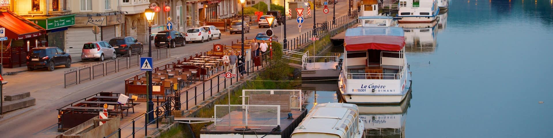 Dinant featuring a small town or village, a coastal town and a sunset