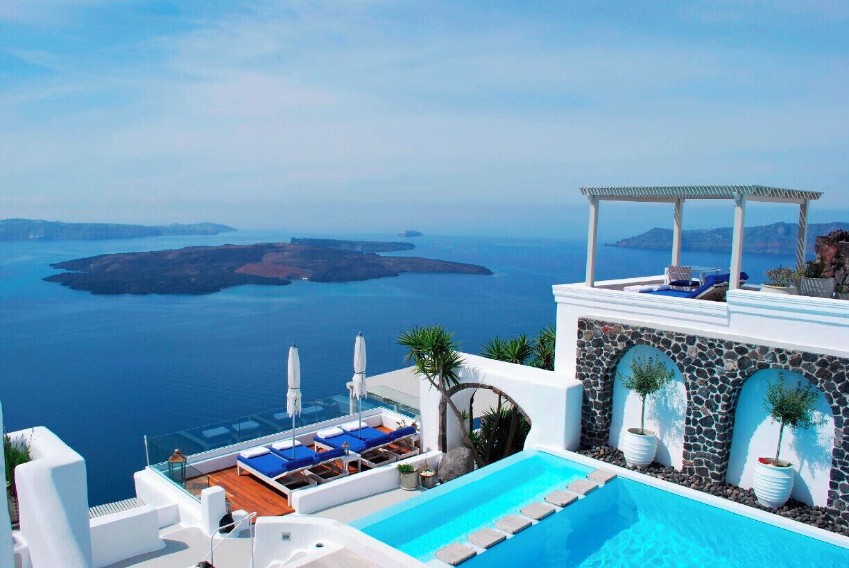 The amazing views from the Iconic Santorini, boutique cave hotel.  There are no words to explain how romantic, peaceful and beautiful this location and property is.  True luxury with Greek style and hospitality.  A lovely location for any wedding, honeymoon or special occassion.  #architecture #alwatsbehoneymooning #MantisGroup