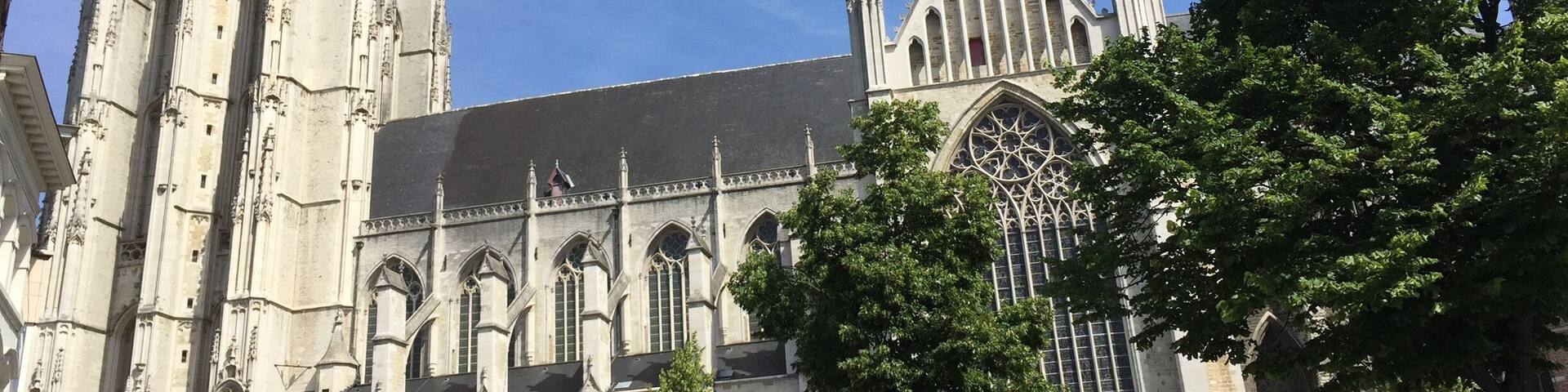Dominating the horizon of Mechelen with its 98 metres, the 15th century Sint-Romboutstoren has a funny story. In the 1600s, a drunk local thought the tower was on fire. He alarmed the whole city and the people pulled up lots and lots of buckets of water, up all 538 steps, to extinguish the flames... Until it suddenly disappeared. It was a misty day, and when the moon slipped through the haze, the people realized there never really was a fire.. They were actually trying to extinguish the moon. That is why the people of Mechelen are still called the Moon Extinguishers today! (Or Maneblussers in Dutch)