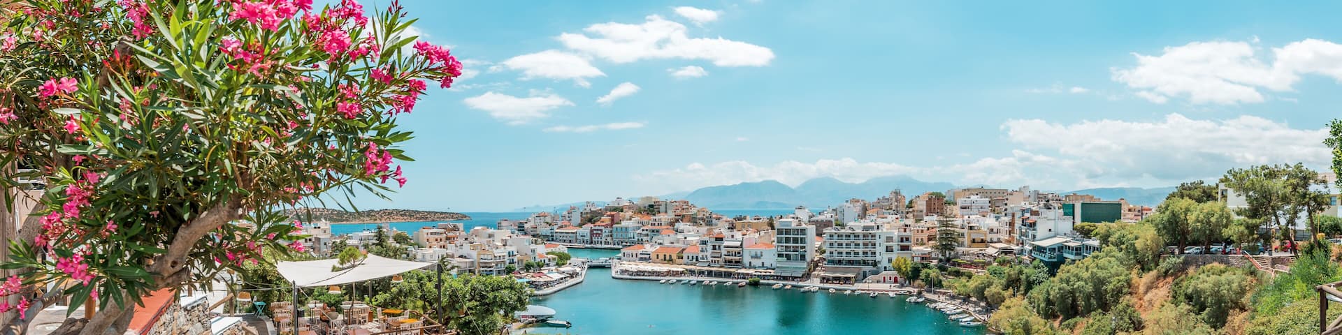 Agios Nikolaos, crete island, greece: view over lake Voulismeni (Vouliagmeni) and the pittoresk harbour city