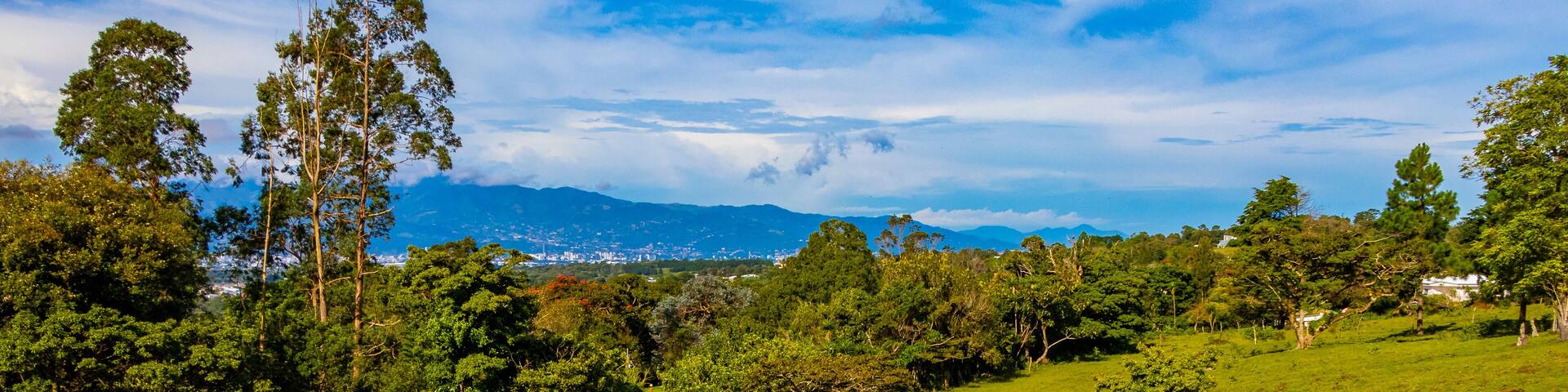 Beautiful mountain landscape city panorama forest trees nature Costa Rica.