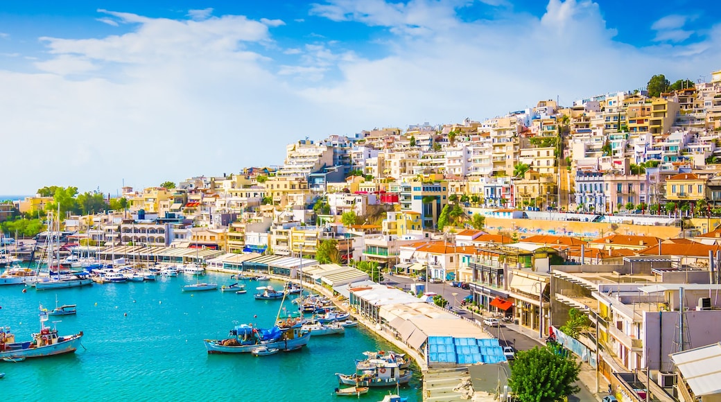 Panoramic view of Mikrolimano with colorful houses along the marina in Piraeus, Greece.