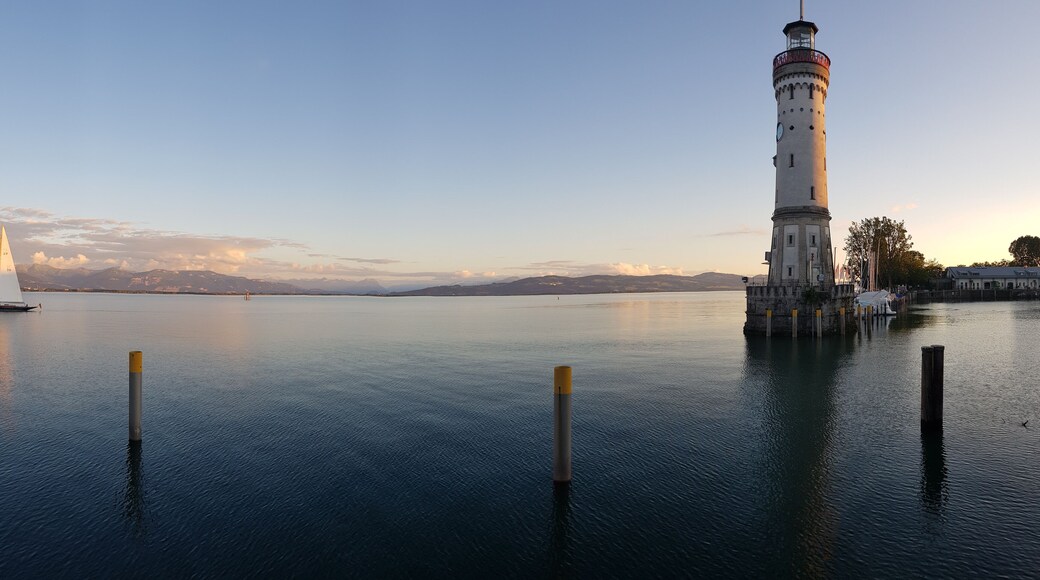 Lighthouse of Lindau with the mountains and the Bodensee.