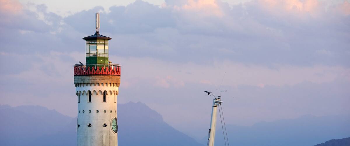 Baden-Wuerttemberg which includes a sunset, a bay or harbour and mountains