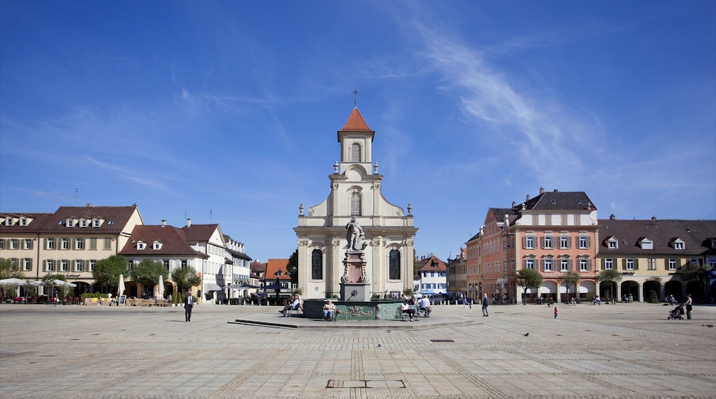 Ludwigsburg som visar ett monument, historisk arkitektur och en staty eller skulptur