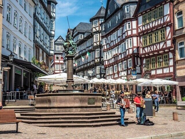 Marburg is located on the banks of the River Lahn in Hesse, Germany. The statue of top of the column is St George slaying the dragon. When I visited the musicians were giving a fine performance of the song “Feelings”. One of Marburg’s most important institutions is Philipps University.

While in Marburg I notice a number of visually impaired people walking with guide sticks. The Philipps University has a number of courses that are designed for people with disabilities.