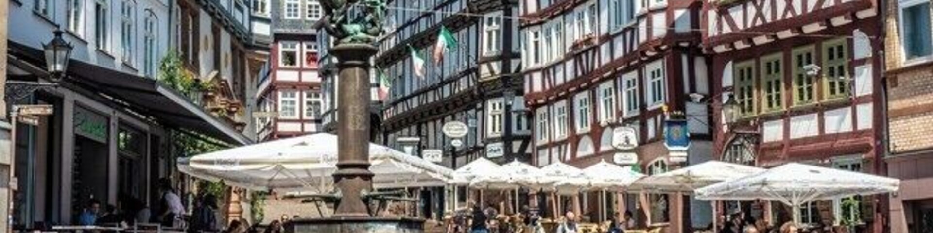 Marburg is located on the banks of the River Lahn in Hesse, Germany. The statue of top of the column is St George slaying the dragon. When I visited the musicians were giving a fine performance of the song “Feelings”. One of Marburg’s most important institutions is Philipps University.
While in Marburg I notice a number of visually impaired people walking with guide sticks. The Philipps University has a number of courses that are designed for people with disabilities.