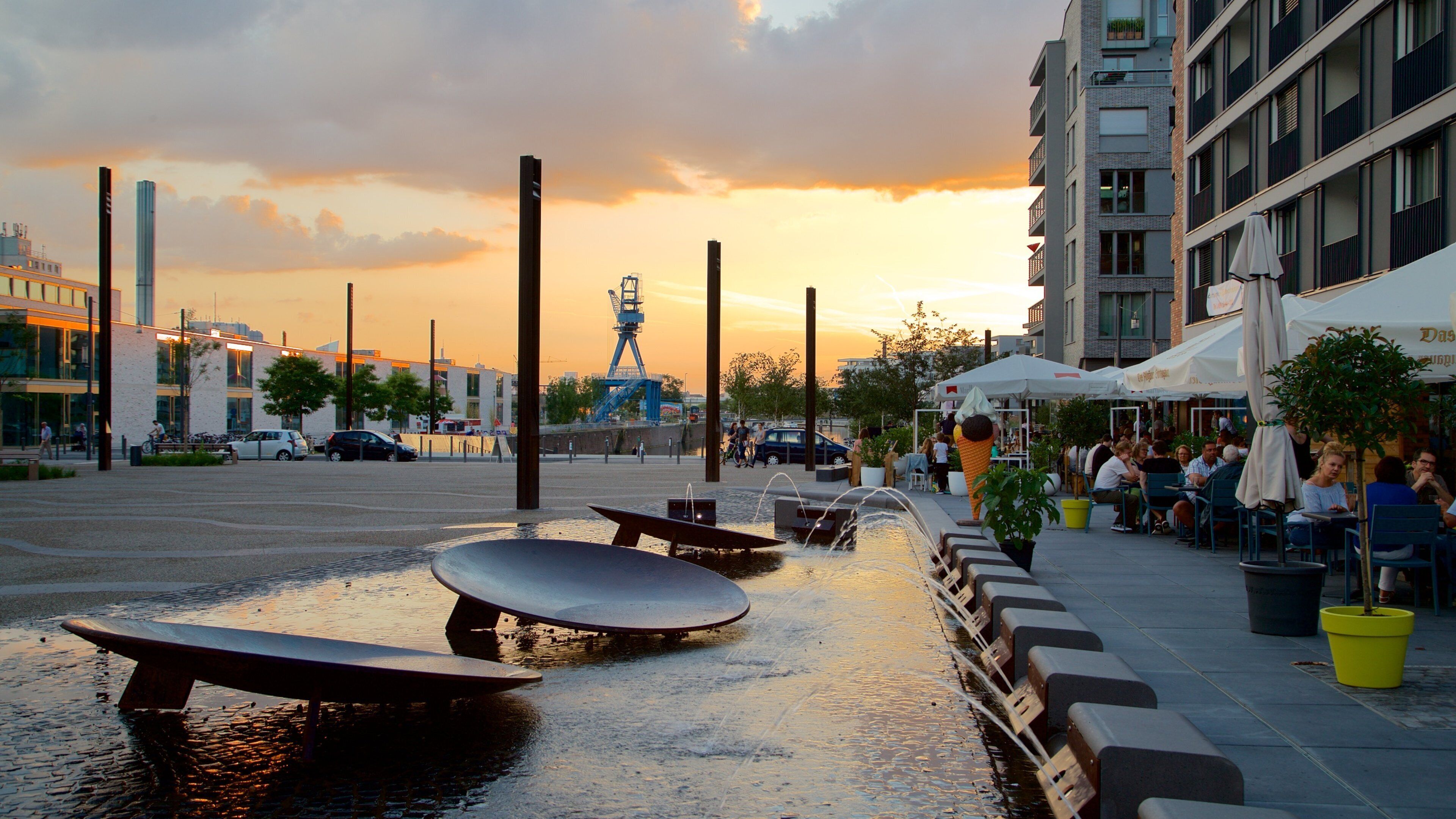 Offenbach am Main featuring outdoor eating, a sunset and a fountain