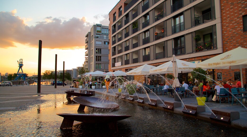 Offenbach am Main which includes a sunset, outdoor eating and a fountain