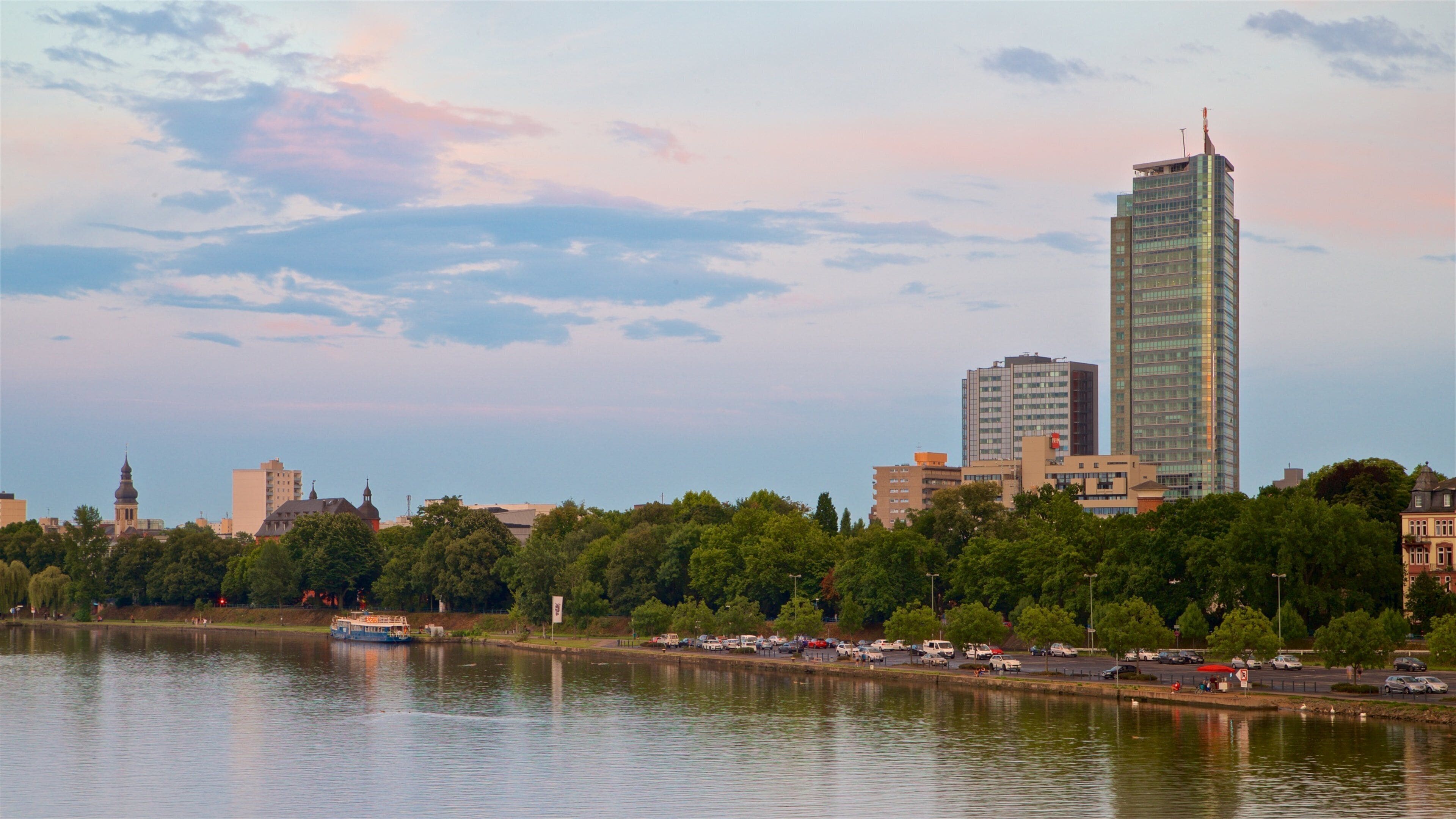 Offenbach am Main which includes a river or creek, a high rise building and a city