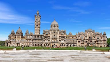 A grand, historic building with multiple domes and a tall tower.