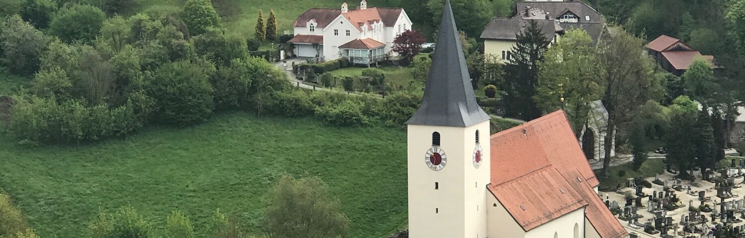 Overlooking Passau, Germany . A local church and cemetery.