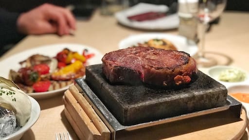 Stranded overnight on a forced layover in Frankfurt but don’t want to eat the free but unappetizing hotel buffet if you are shuttles you to the NH hotel Frankfurt Airport West? Take a two minute walk down to Corner Steakhouse Zur Ziegelhütte. They serve a variety of beef that comes out in a smoking hot stone so you can cook it to your liking. It’s gimmicky, sure, but it’s also delicious. Sides are great and service was great until they brought out THREE steaks instead of ONE 300gram steak for us to share 😂
Even if that made them hate us a bit, we still loved our dinner and it was the only bright spot in an, otherwise, stressful situation
#Germany #Frankfurt #delicious # layover #delicious