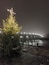 Old stone bridge during December. #regensburg #germany #bridge #foggynight #christmastree