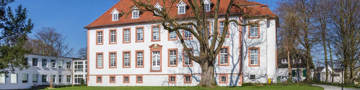 Panorama of park and historic mansion Reckenburg in Wiedenbruck, Germany