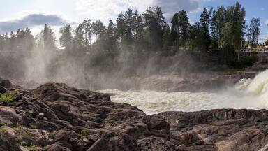 The Imatra Rapids (Imatrankoski) on the Vuoksa River in Imatra. Spillway on hydroelectric power station dam musical show. National landscape of Finland