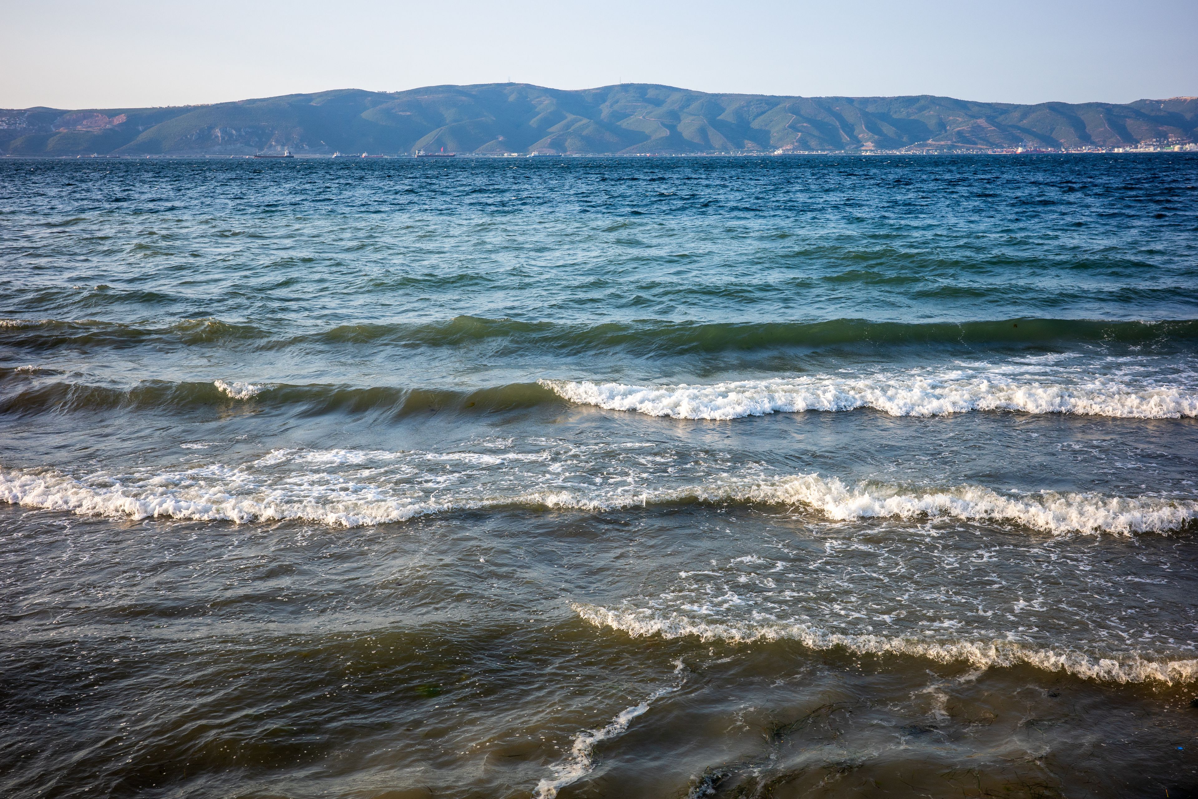 Waves on Marmara Sea with mountains