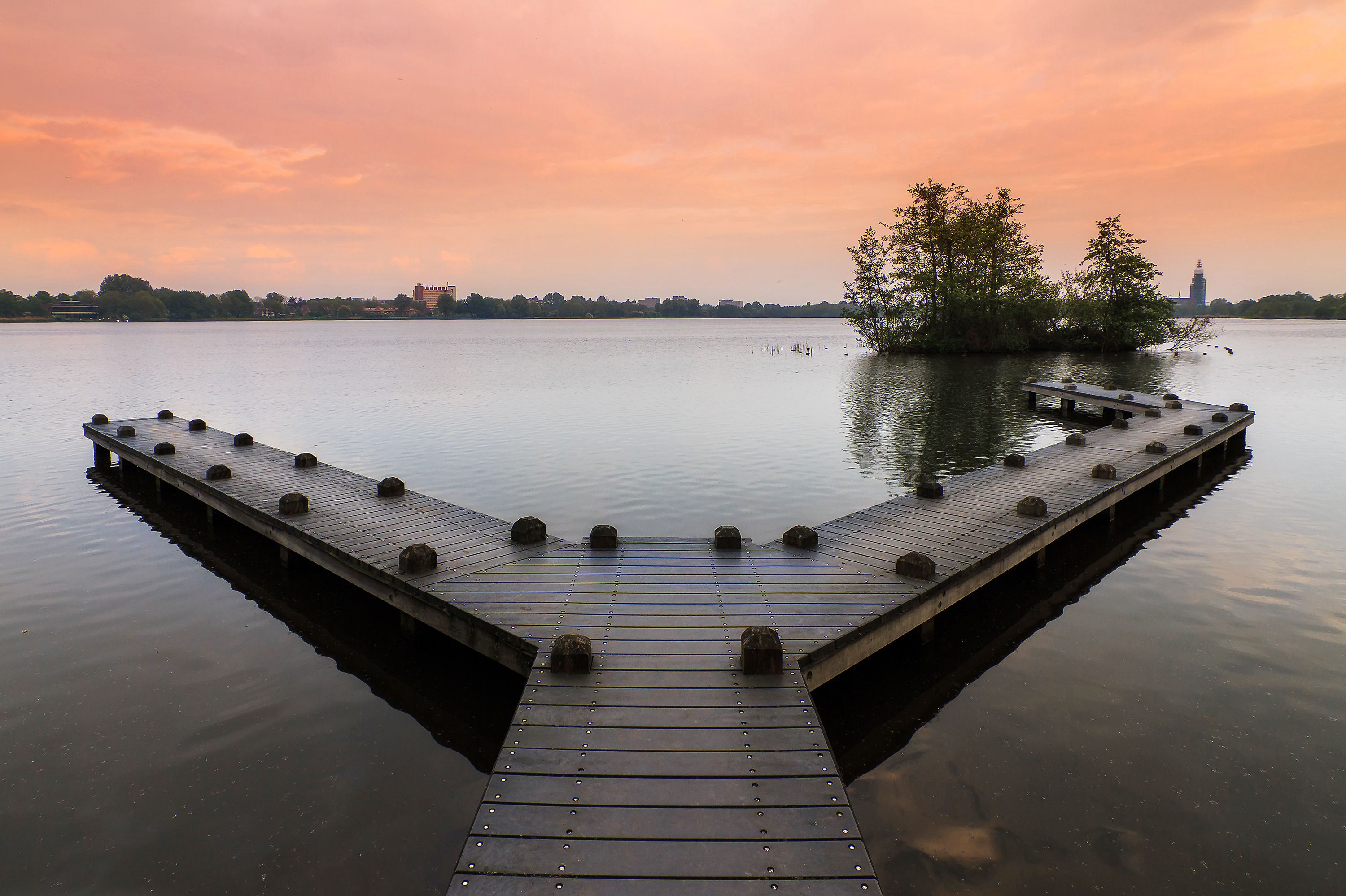 Beautiful jetty at lake the Poel in the Amsterdam forest (Amsterdamse bos) in spring