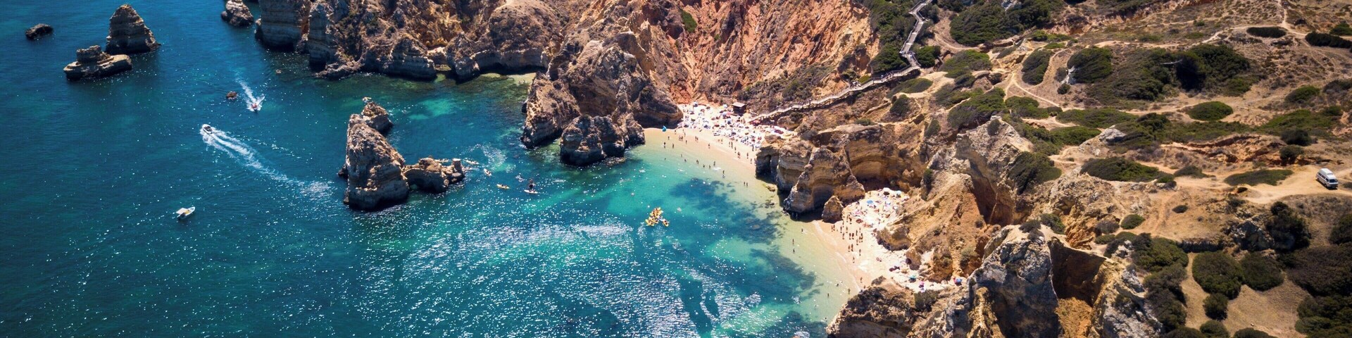 Quintessential Algarve coastline in Portugal. Get there early to ensure you find a space on the beach. Gets very busy in summer. #LifeAtExpedia #Beaches
