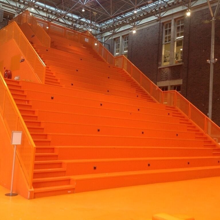 The stairs in this university have that obligatory national colour!