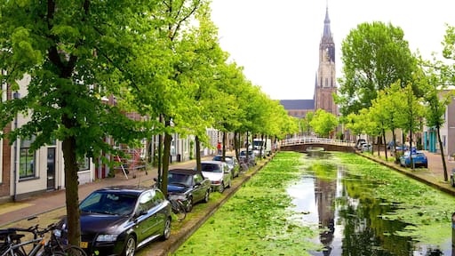 Delft showing a river or creek and street scenes