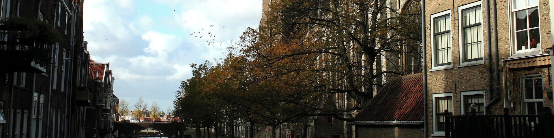 Historic city Dordrecht.
The name Dordrecht comes from Thuredriht (ca 1120), Thuredrecht (ca 1200). The name seems to mean 'thoroughfare'; a ship-canal or -river through which ships were pulled by rope from one river to another, as here from the Dubbel to the Merwede, or vice versa.
The city was formed along the Thure river, in the midst of peat swamps. This river was a branch of the river Dubbel, which is part of the massive RhineâMeuseâScheldt delta complex, near the current Bagijnhof. Around 1120 reference to Dordrecht was made by a remark that count Dirk IV of Holland was murdered in 1049 near "Thuredrech"
info:
https://en.wikipedia.org/wiki/Dordrecht