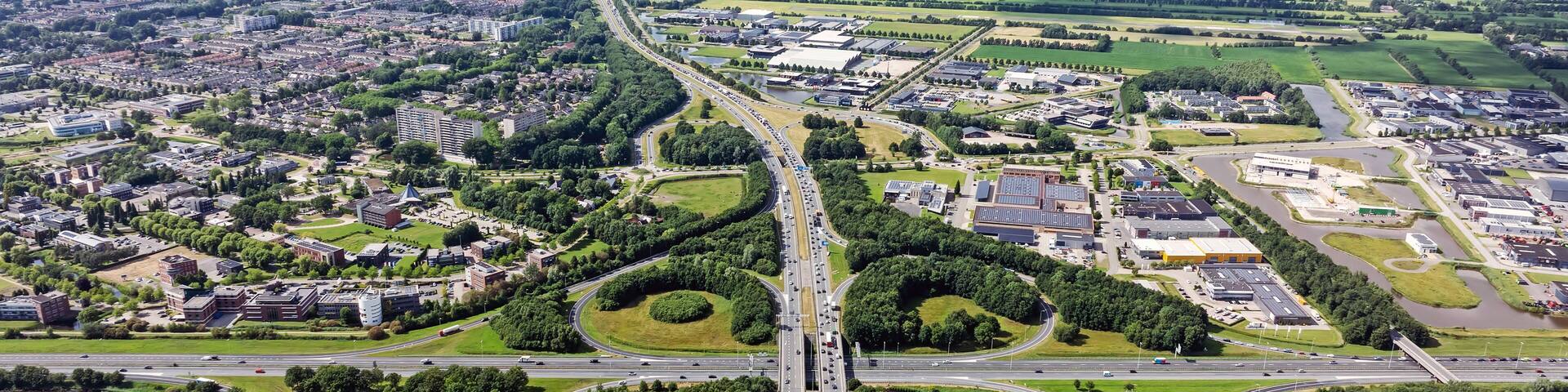 Aerial from traffic on the cloverleaf junction Drachten in the Netherlands