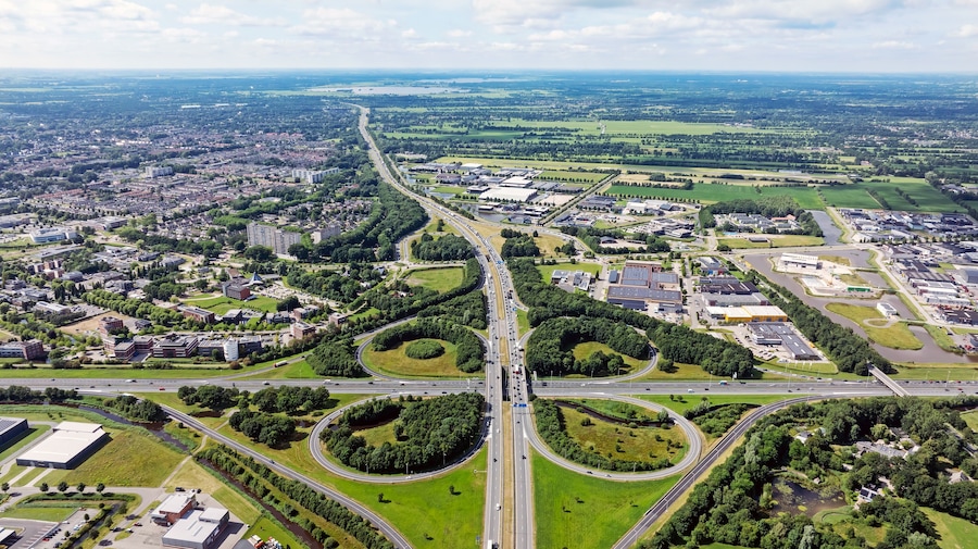 Aerial from traffic on the cloverleaf junction Drachten in the Netherlands