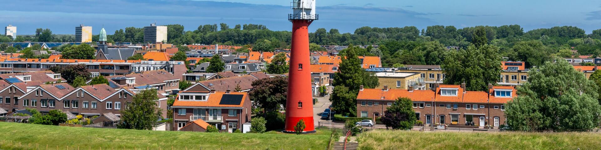 view of the lighthouse and village of Hoek van Holland on the Rhine Estuary