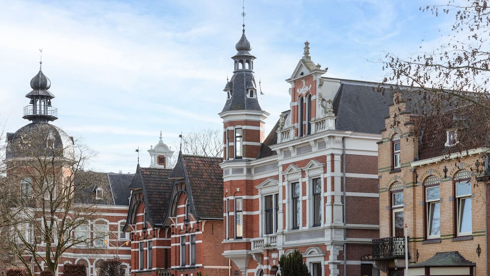 Historic buildings with different facades in the center of the Dutch town of Oss.