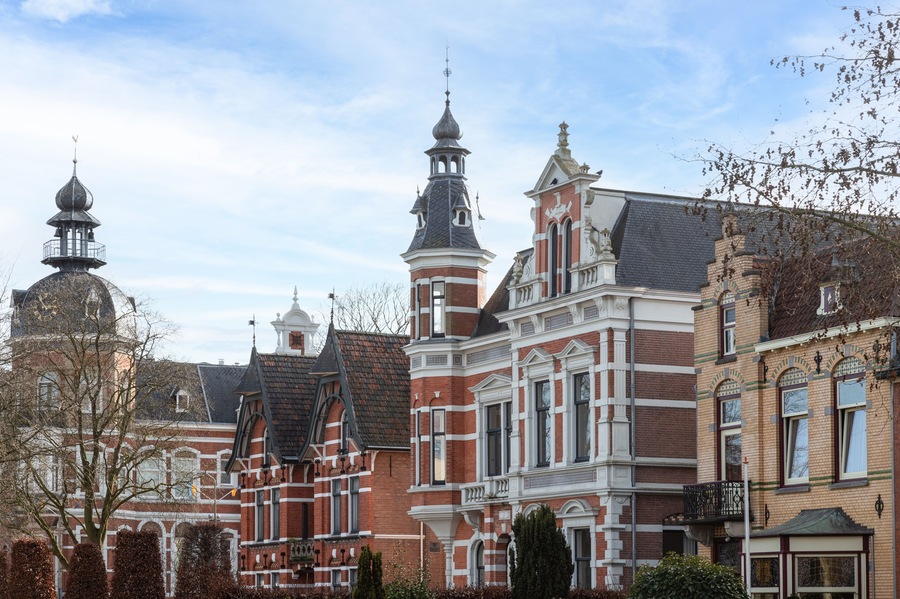 Historic buildings with different facades in the center of the Dutch town of Oss.