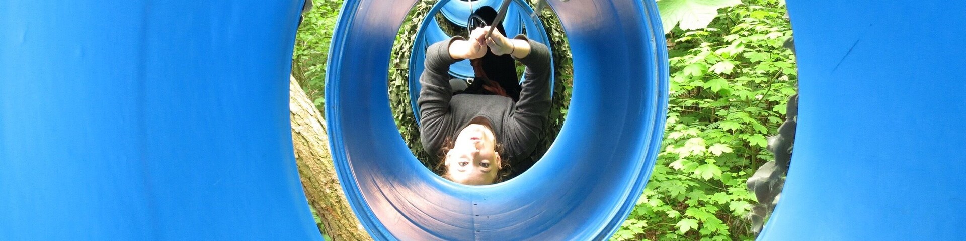 Up in the trees on the adventure course at Duinrell.