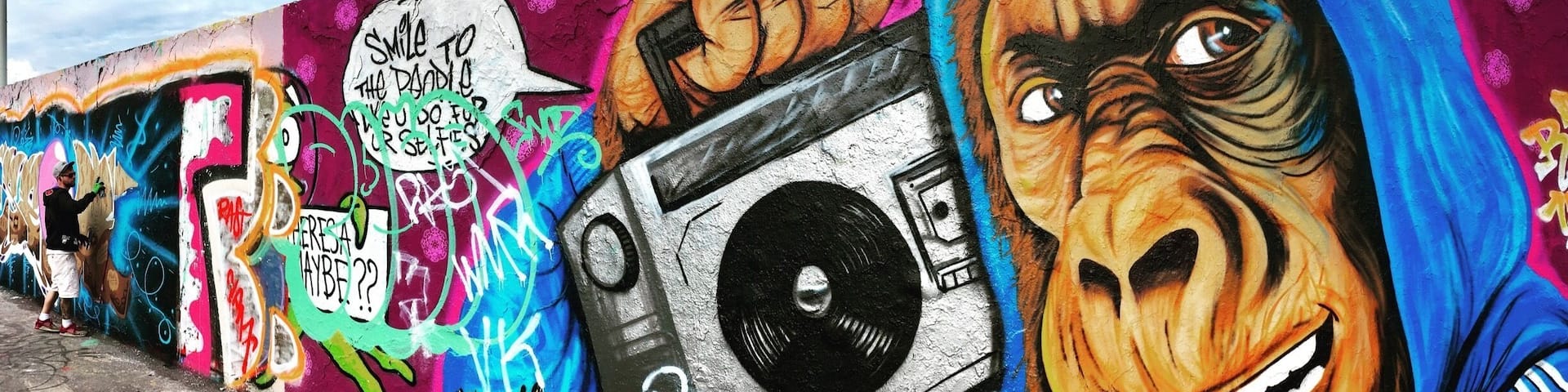 Mauer Park Berlin contains one of the last remaining sections of the Berlin Wall, now used as a giant concrete canvass. With everyone equally entitled to use the space, the art is constantly changing.
Mauer park is also home to the iconic Bear Pit Karaoke which attracts thousands of visitors every Sunday.
http://www.6-degrees-of-freedom.com/2017/09/how-to-repurpose-sorrow-into-hope/