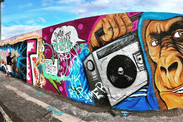 Mauer Park Berlin contains one of the last remaining sections of the Berlin Wall, now used as a giant concrete canvass. With everyone equally entitled to use the space, the art is constantly changing.
Mauer park is also home to the iconic Bear Pit Karaoke which attracts thousands of visitors every Sunday.
http://www.6-degrees-of-freedom.com/2017/09/how-to-repurpose-sorrow-into-hope/