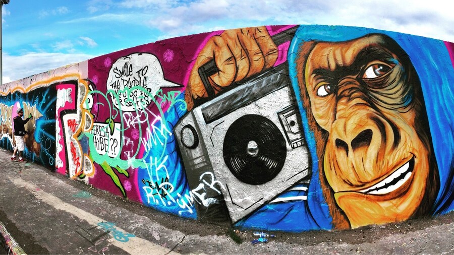 Mauer Park Berlin contains one of the last remaining sections of the Berlin Wall, now used as a giant concrete canvass. With everyone equally entitled to use the space, the art is constantly changing.
Mauer park is also home to the iconic Bear Pit Karaoke which attracts thousands of visitors every Sunday.
http://www.6-degrees-of-freedom.com/2017/09/how-to-repurpose-sorrow-into-hope/