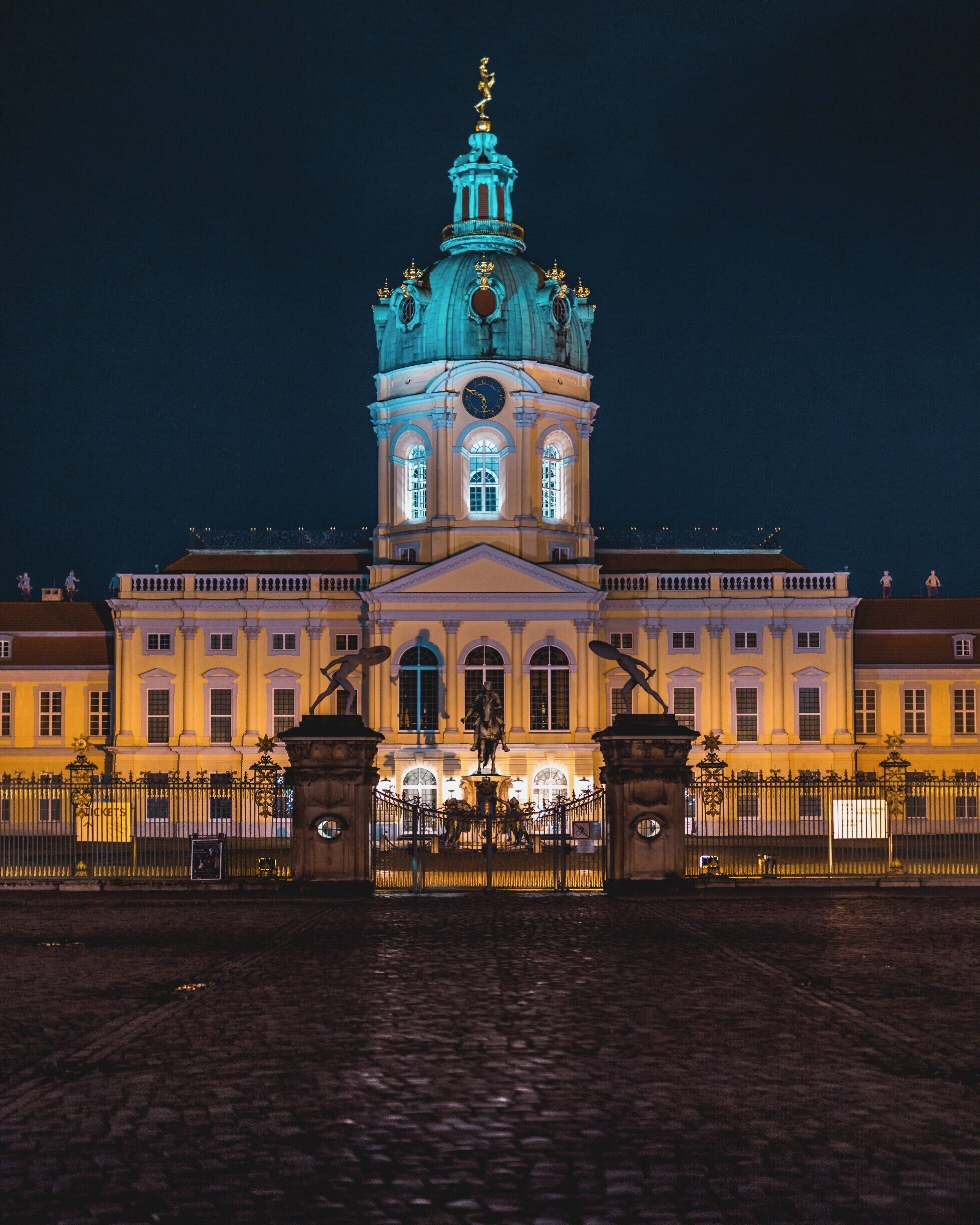 The Palace of Charlottenburg, in the suburbs of Berlin, seen after closing time from the square in front.