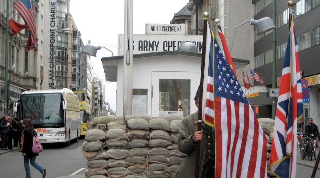 Berlin is well worth a visit and stay at least five days. The wall is sombre yet fascinating. I chose to put in the photo of Checkpoint Charlie, but don't skip the sad history. #walls