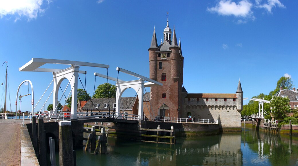 Panoramic view of Zuidhavenpoort city gate and drawbridge over a harbor channel in Zierikzee city, Netherlands