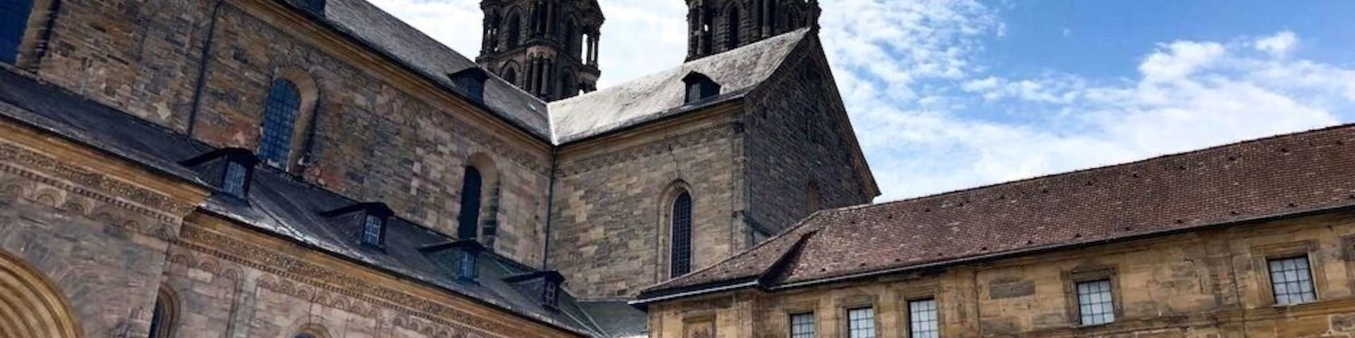 The Bamberg Cathedral is a church in Bamberg, Germany, completed in the 13th century. The cathedral is under the administration of the Roman Catholic Church and is the seat of the Archbishop of Bamberg. Since 1993, the cathedral has been part of the UNESCO World Heritage Site "Town of Bamberg".
It was founded in 1002 by King (and later Emperor) Heinrich II (Henry II) and consecrated in 1012. After the first two cathedrals burned down in the 11th and 12th centuries, the current structure, a late Romanesque building with four large towers, was built in the 13th century.