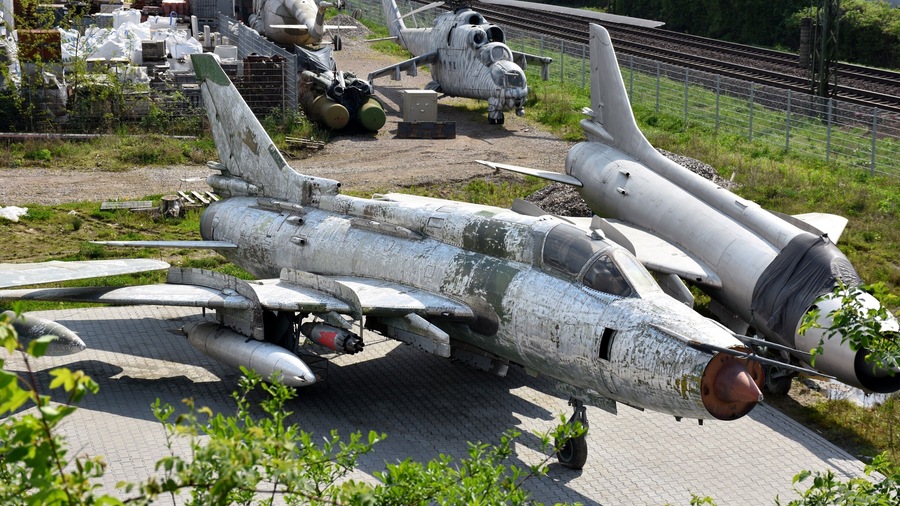 8 classic Eastern block aircraft sit in a museum