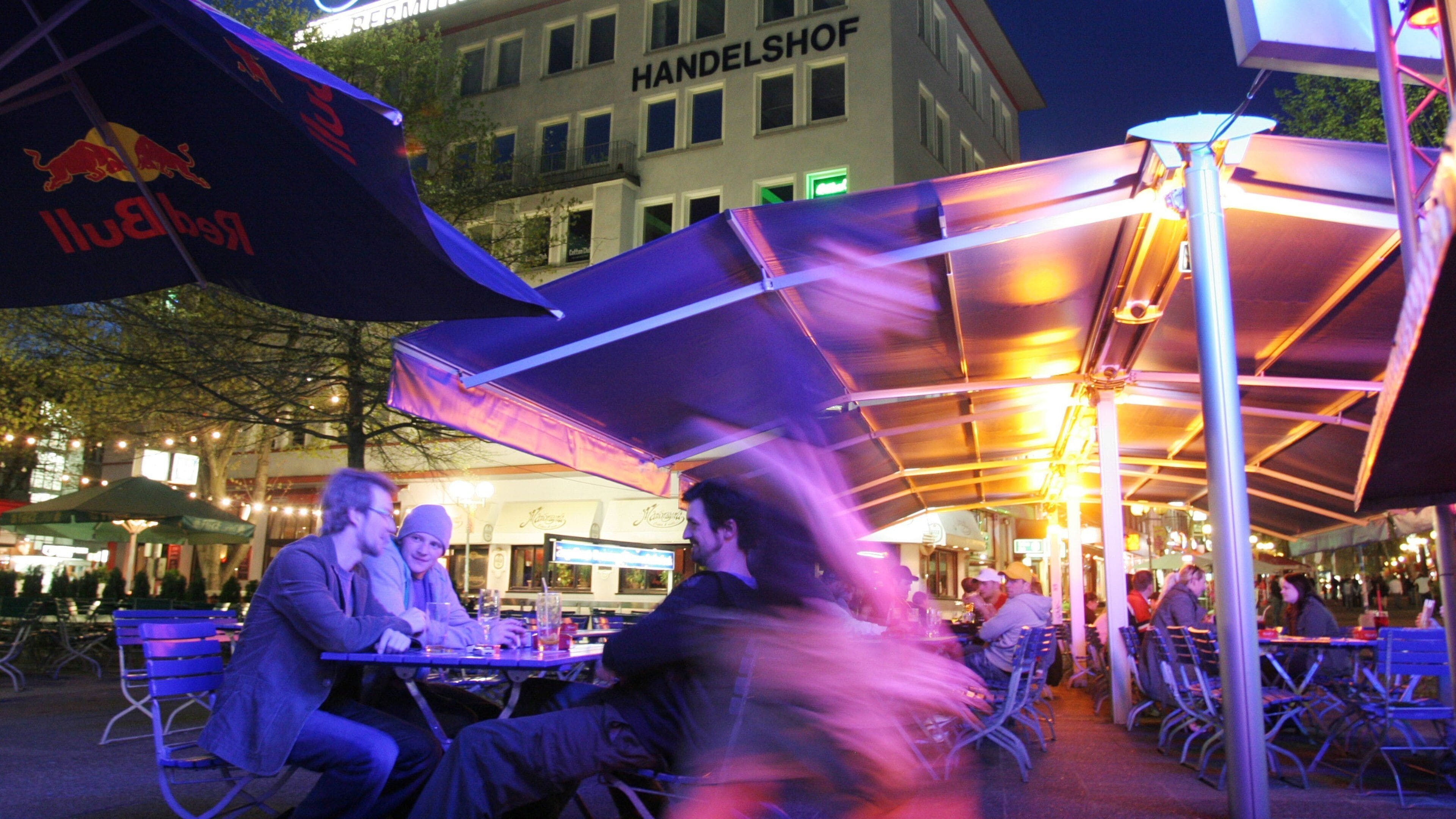 Bochum which includes a square or plaza, night scenes and a city