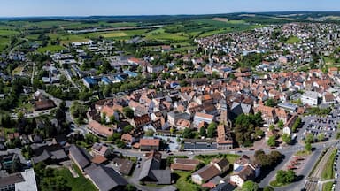 Aerial panoramic view of the old town city Buchen in Germany on a sunny spring noon.