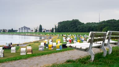 Park bench on top of a dike at the beach of Cuxhaven, Germany.