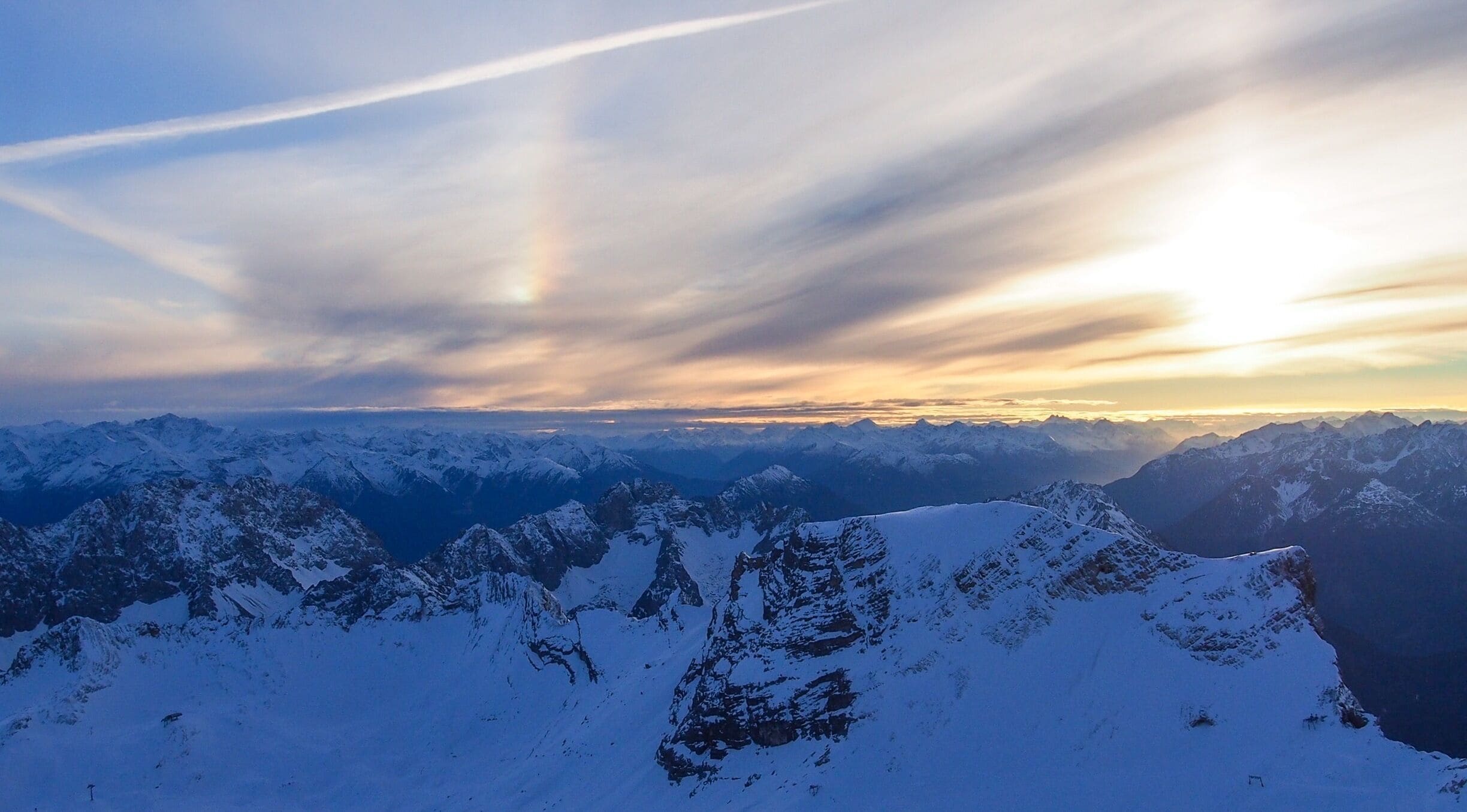 A train and a couple cable cars and you are the top of the highest point in Germany, Zugspitz.  

Quite a remarkable view from this vantage point and I'd highly recommend the trek to the top if you're in the area.
