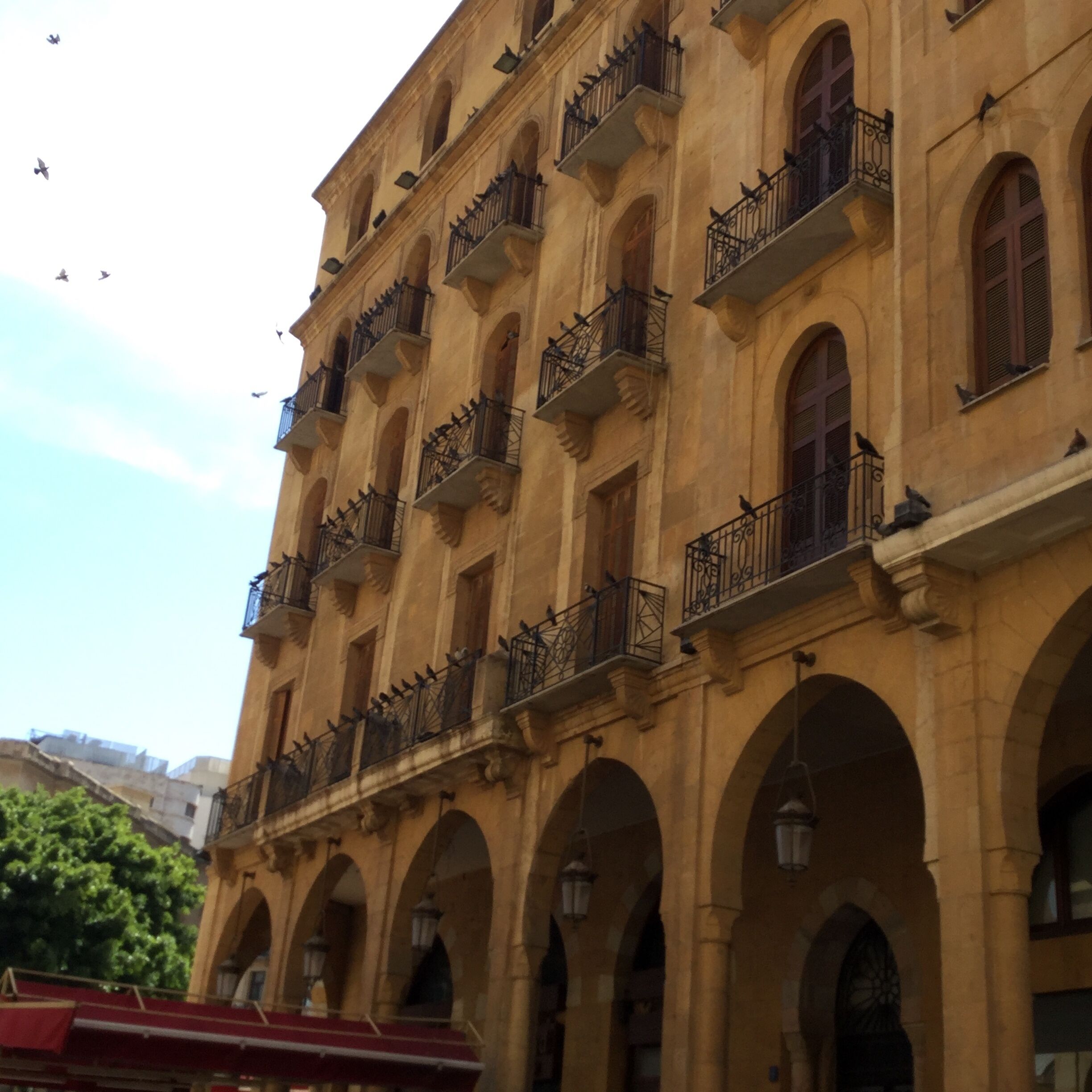 The Place de l’Étoile is the central square in downtown Beirut. The square has a number of official buildings including the Lebanese Parliament, Ministry of Finance, and a museum as well as two cathedrals and numerous cafes and restaurants.   Following the assignation of Rafic Hariri, the former Prime Minister of Lebanon, on February 14, 2005, the square was closed to traffic. Today, the square is largely empty, with just some pedestrians walking to work or to the cafes but mostly filled with an enormous population of pigeons.