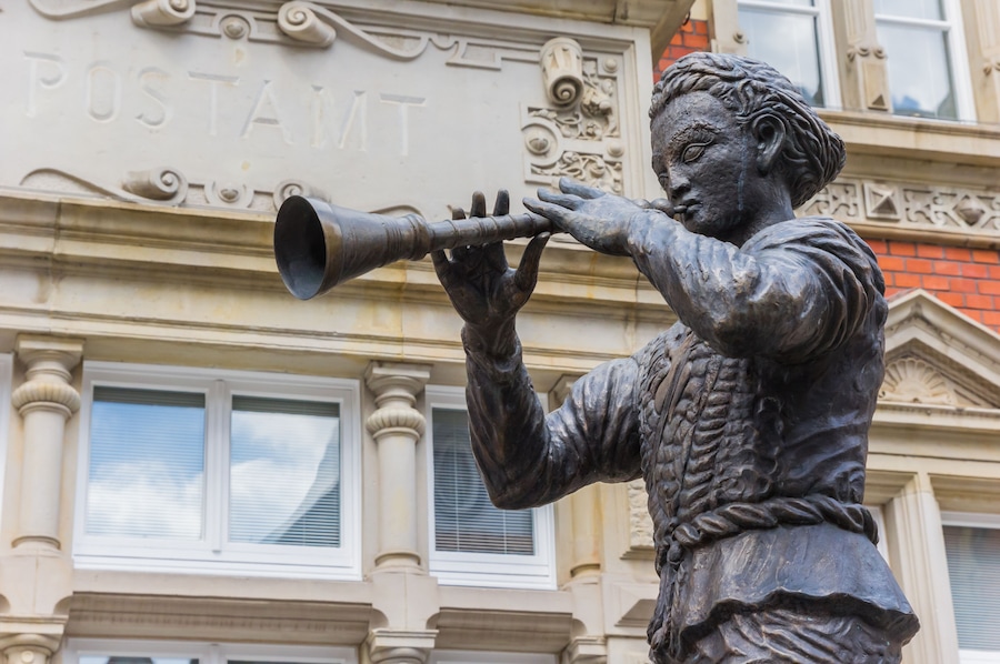 Statue of the Pied Piper of Hamelin in Hameln, Germany; Shutterstock ID 653268028